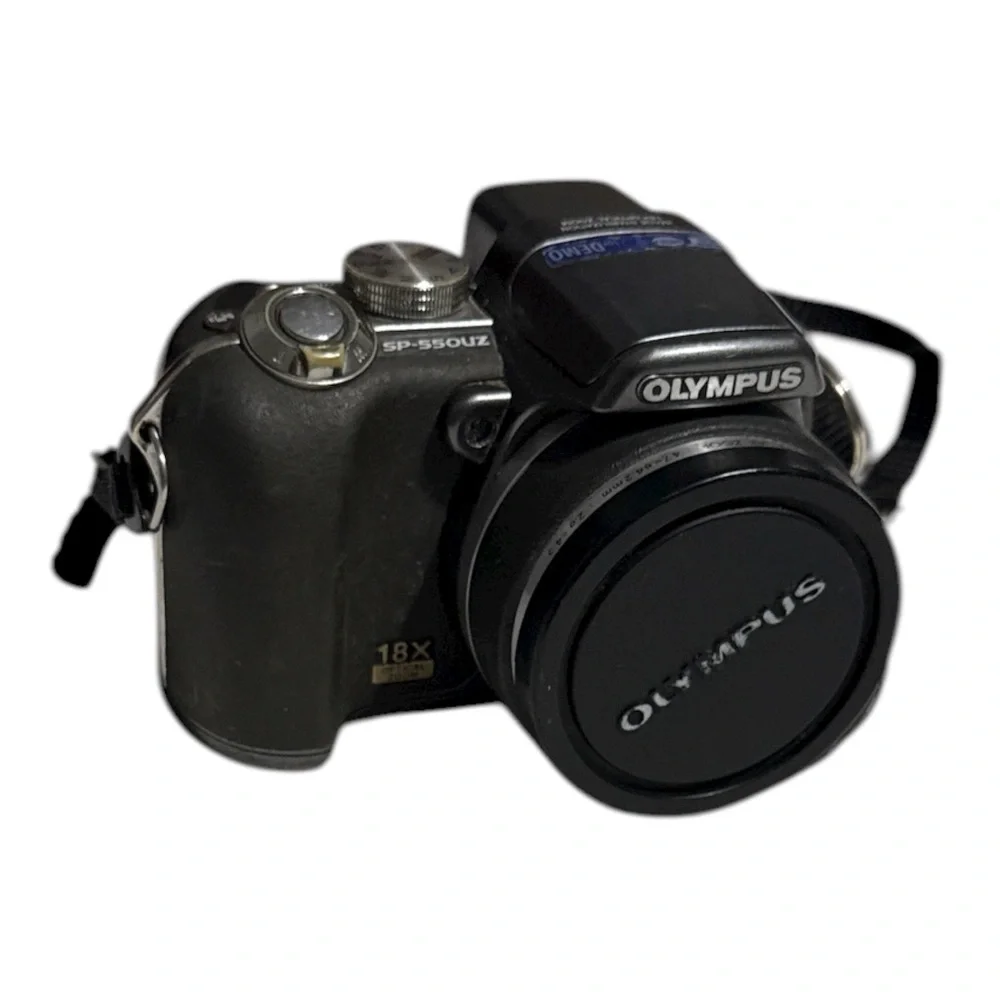 Olympus Black Digital Camera with Lens and Strap